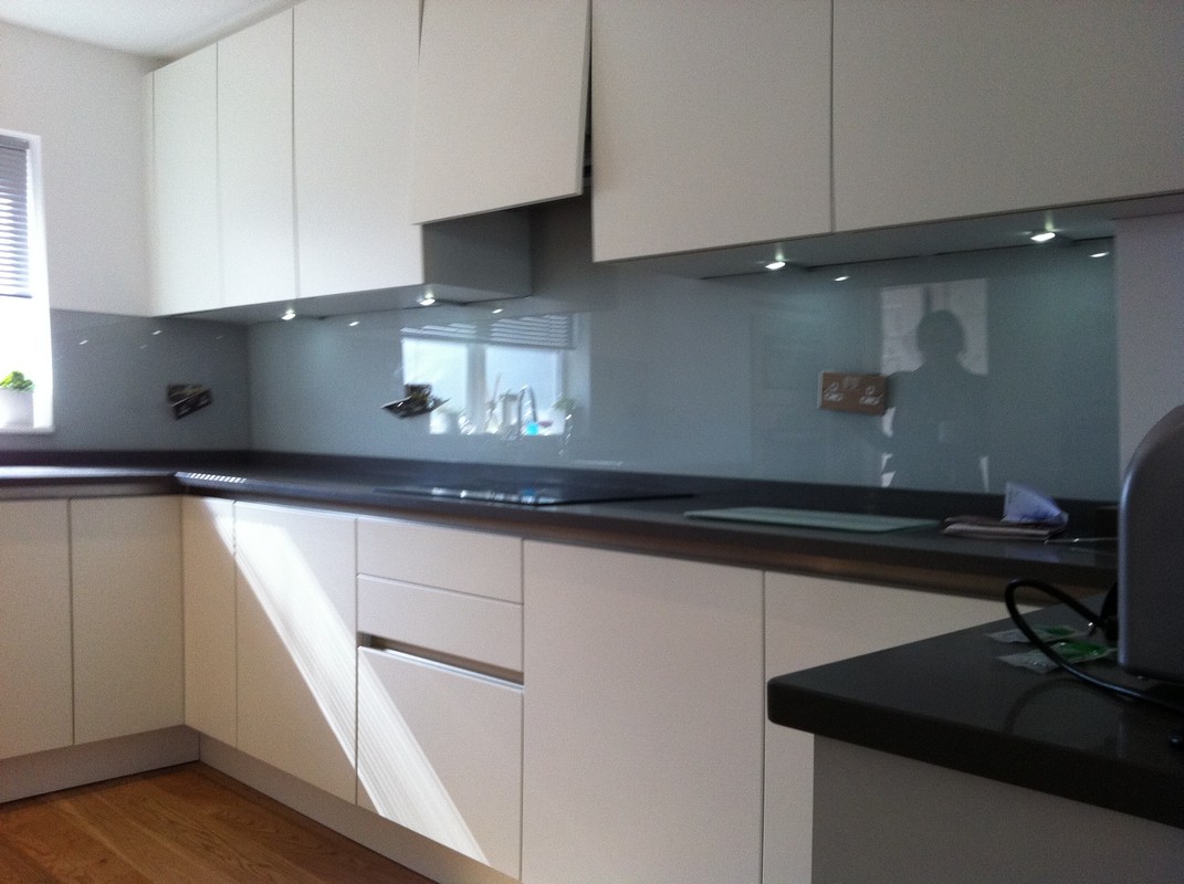 Grey glass kitchen splashback with LED lighting in Waltham Cross