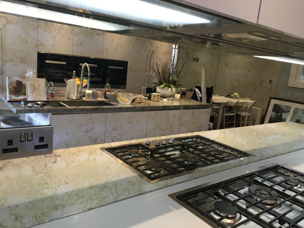 Mirror glass splashback in Waltham Cross luxury kitchen