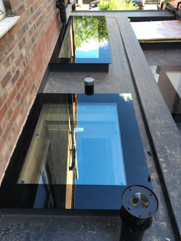 Multiple flat roof skylights on extension in Waltham Cross